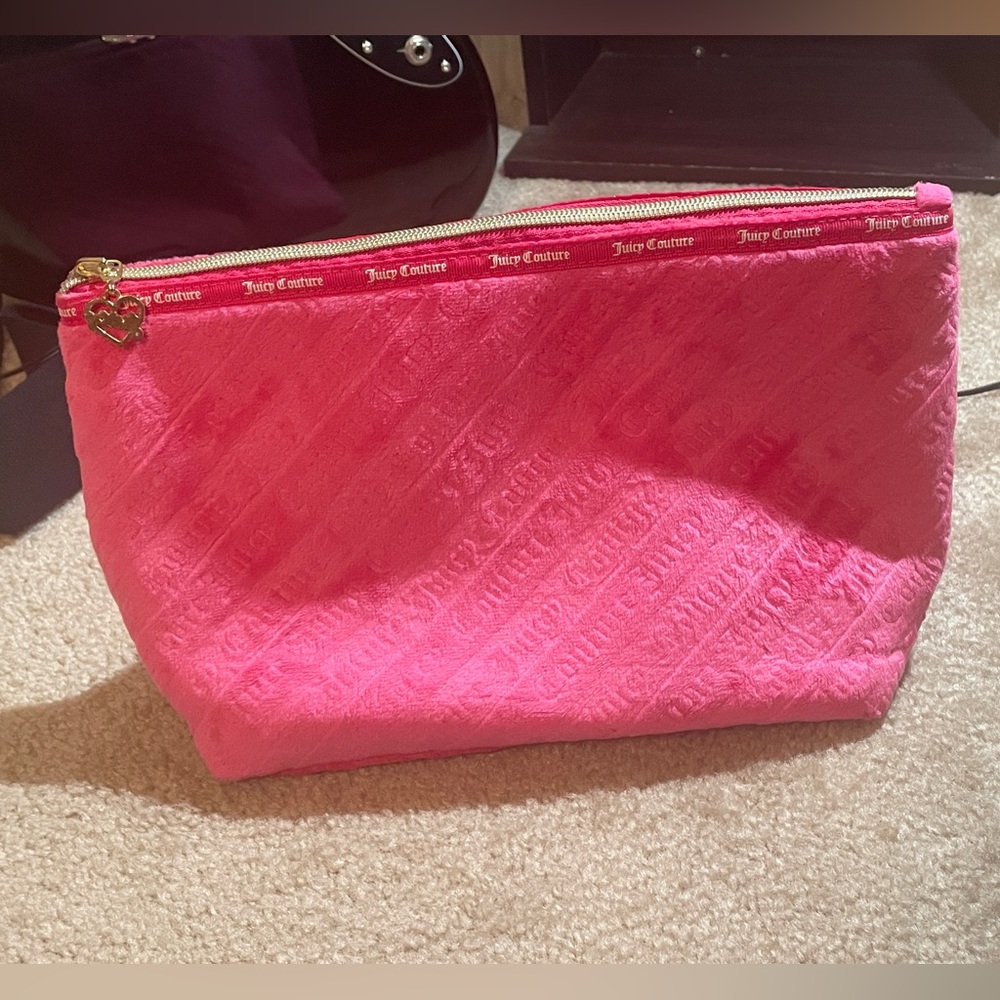 Hot pink juicy couture wedge makeup bag with logo print in soft velvet material